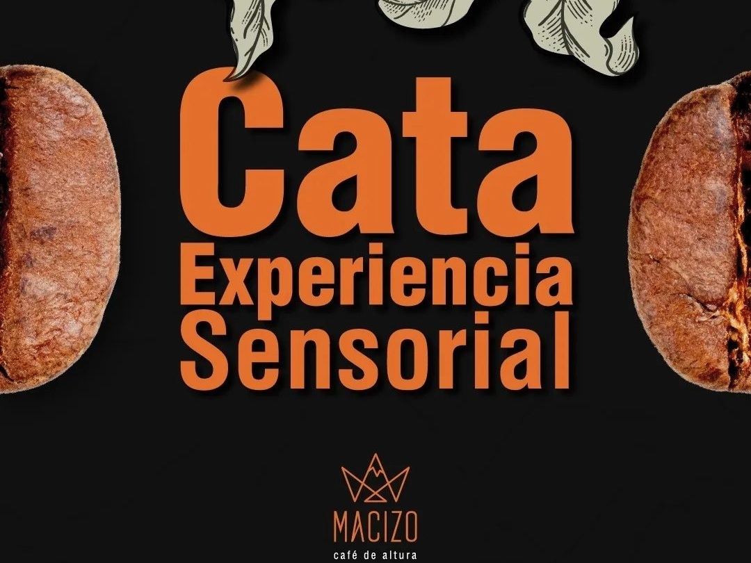 Un aviso fondo negro con letras grandes y naranjas que dice Cata Experencia Sesorial. Hay medio trozo de café en cada lado del aviso.